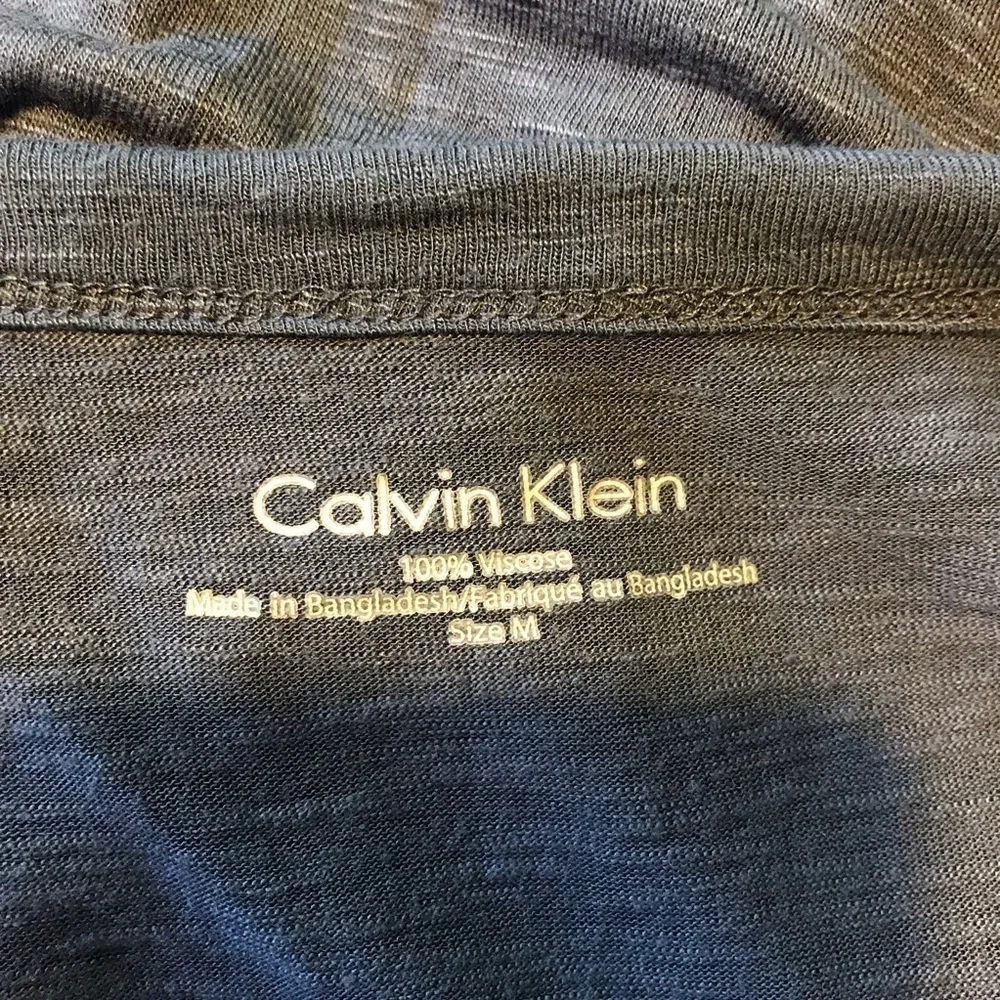 Calvin Klein: Blue/ Black Short Sleeved Snake Top